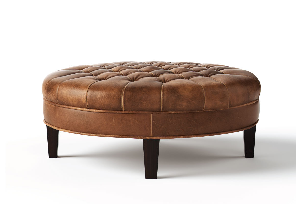 Cambridge tufted ottoman from Vogel by Chervin in brown leather and espresso legs with a hand-tufted top