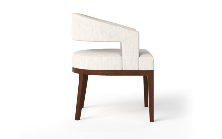 Curved arm and back of the Zayn Chair by Vogel