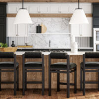 Four black Marlowe counter stools in modern kitchen.